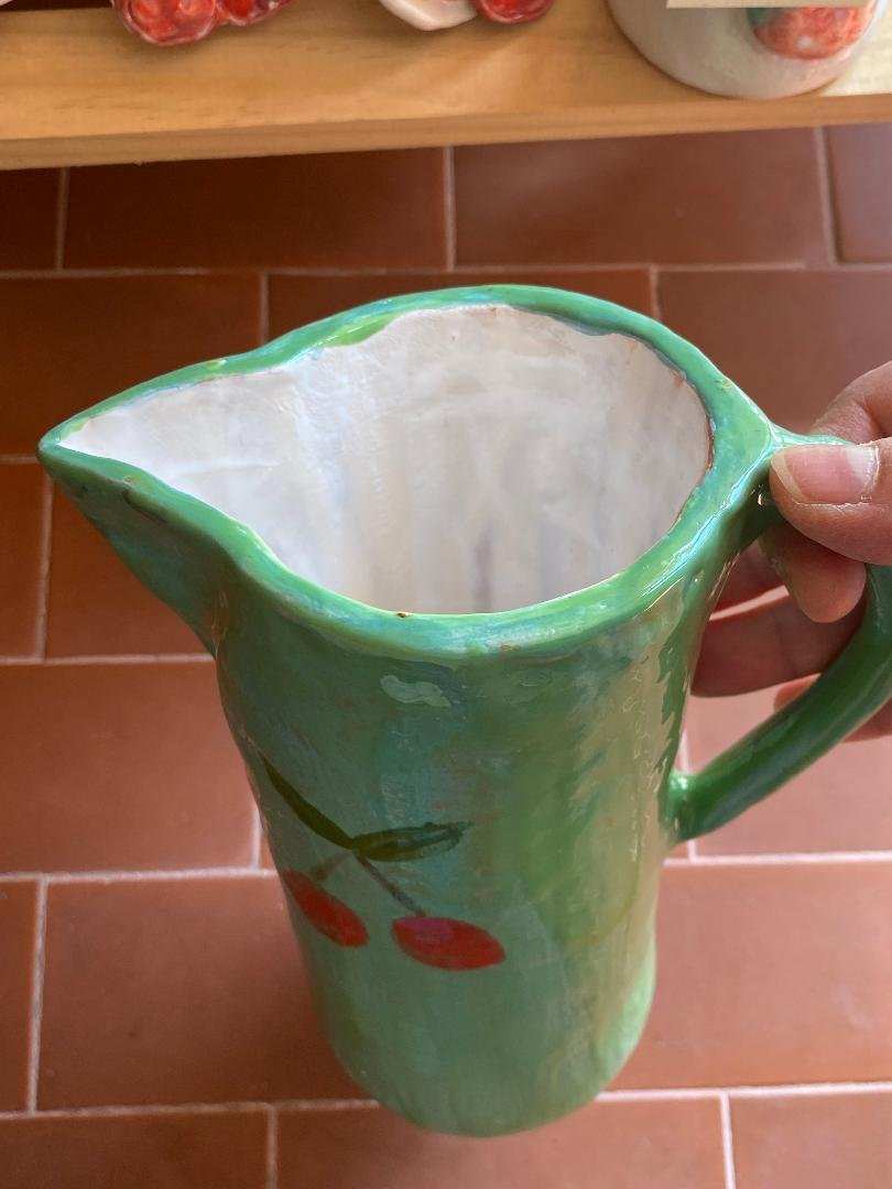 Hand-painted green ceramic brocca with cherry fruit decoration from the Fruit Collection, artisanal Italian craftsmanship pitcher.