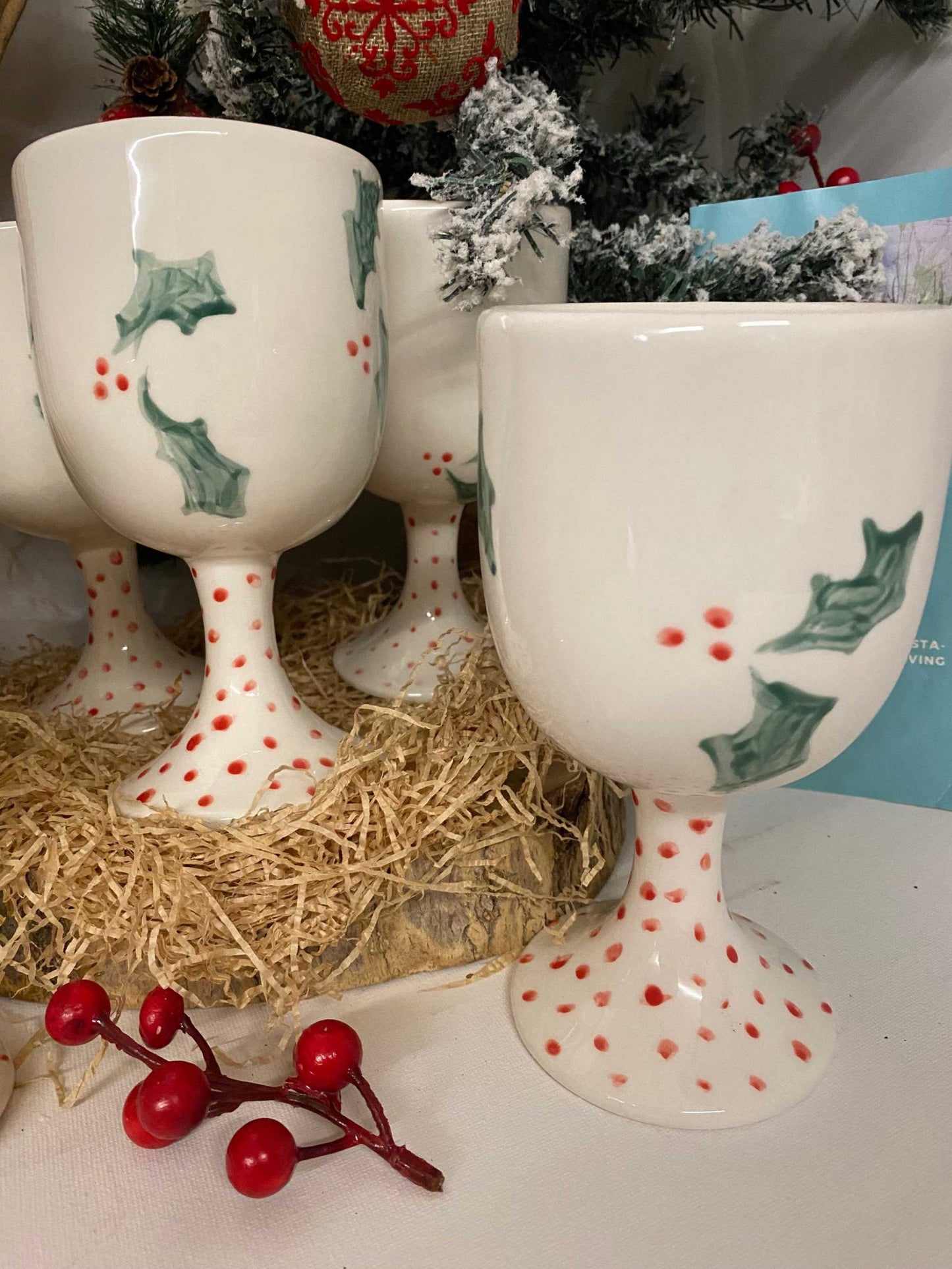 Set of 6 white ceramic wine glasses with green holly and red berry Christmas design, handmade and elegant.