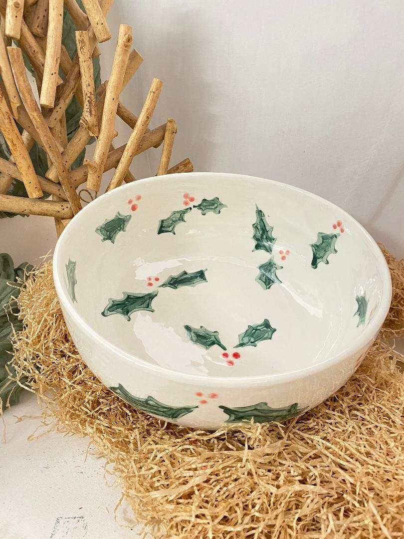 Handmade ceramic salad bowl with Christmas holly and red berry decorations from limited edition Natale collection
