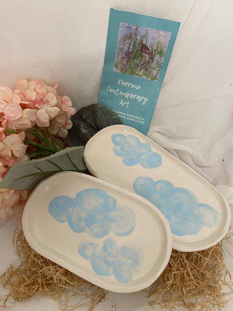 Pair of white ceramic trays with blue cloud design, handmade artisan home decor from the Nuvola collection