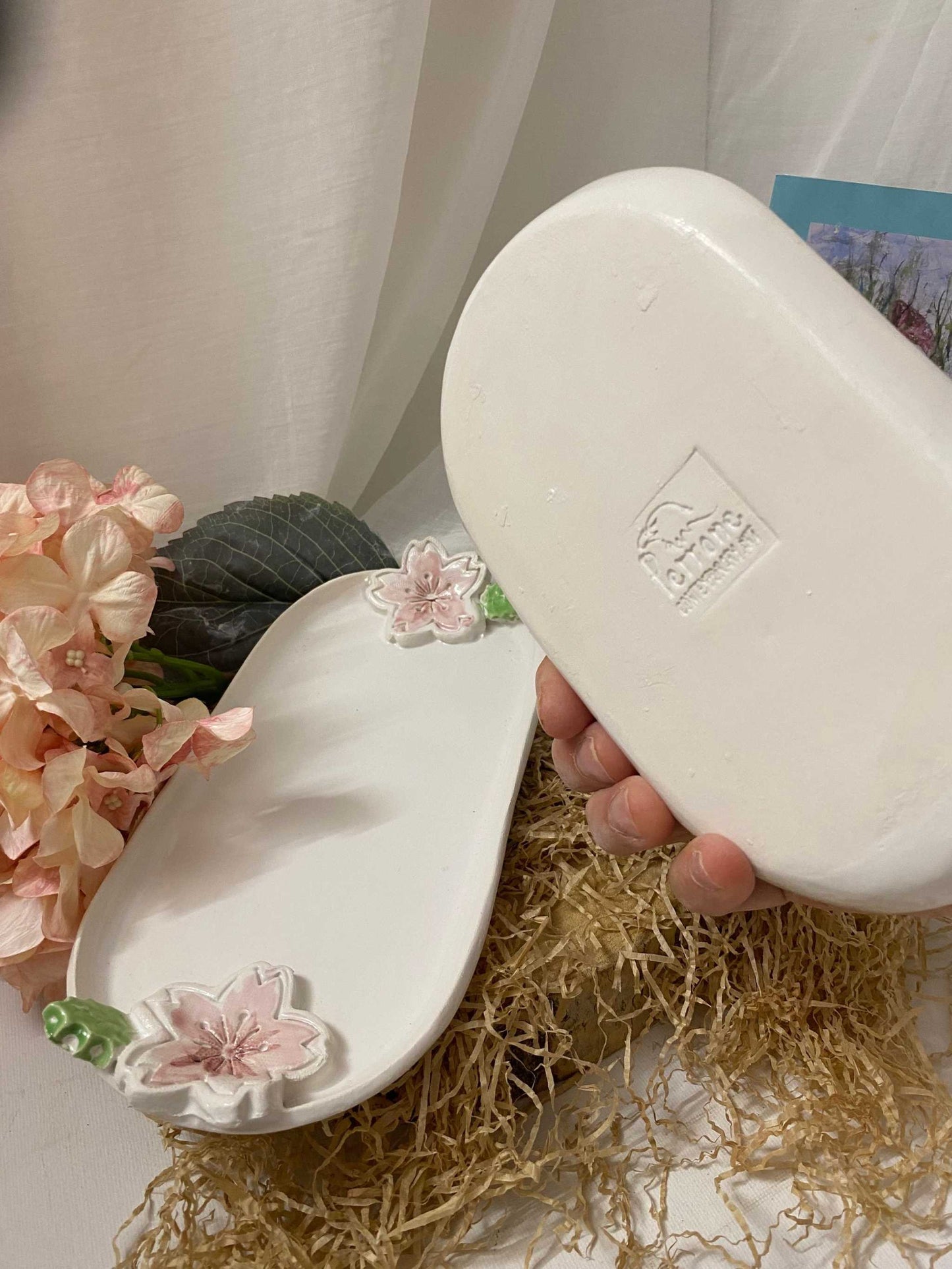 pair of white ceramic trays with pink floral accents from Ciliegio collection handcrafted and elegant design