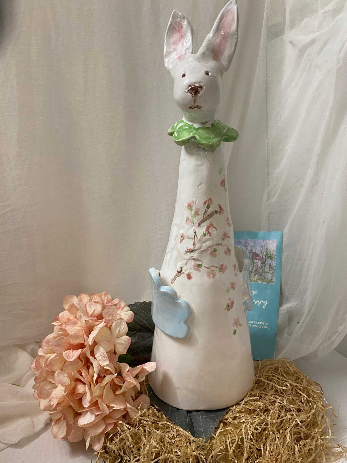 White ceramic Easter bunny decoration with floral motifs from the Decorazione della Collezione Easter collection