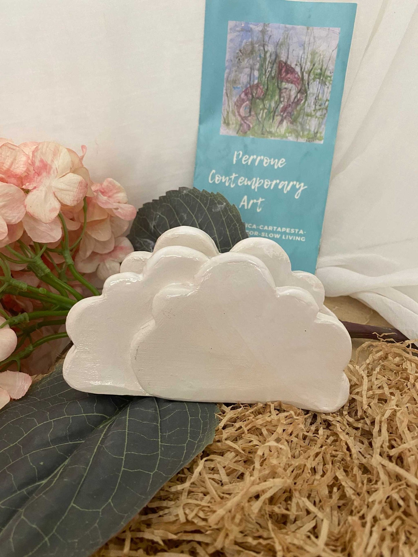 white ceramic cloud-shaped napkin holder handcrafted with irregular edges and glossy finish