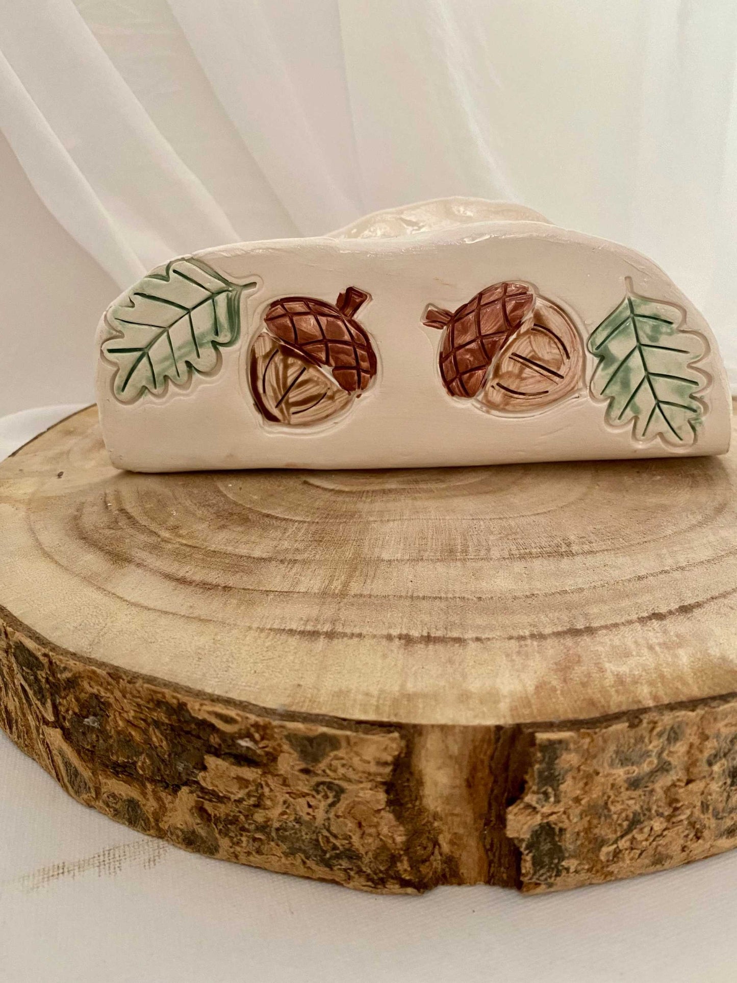 White ceramic napkin holder with autumn acorn and leaf design, handmade rustic table decor
