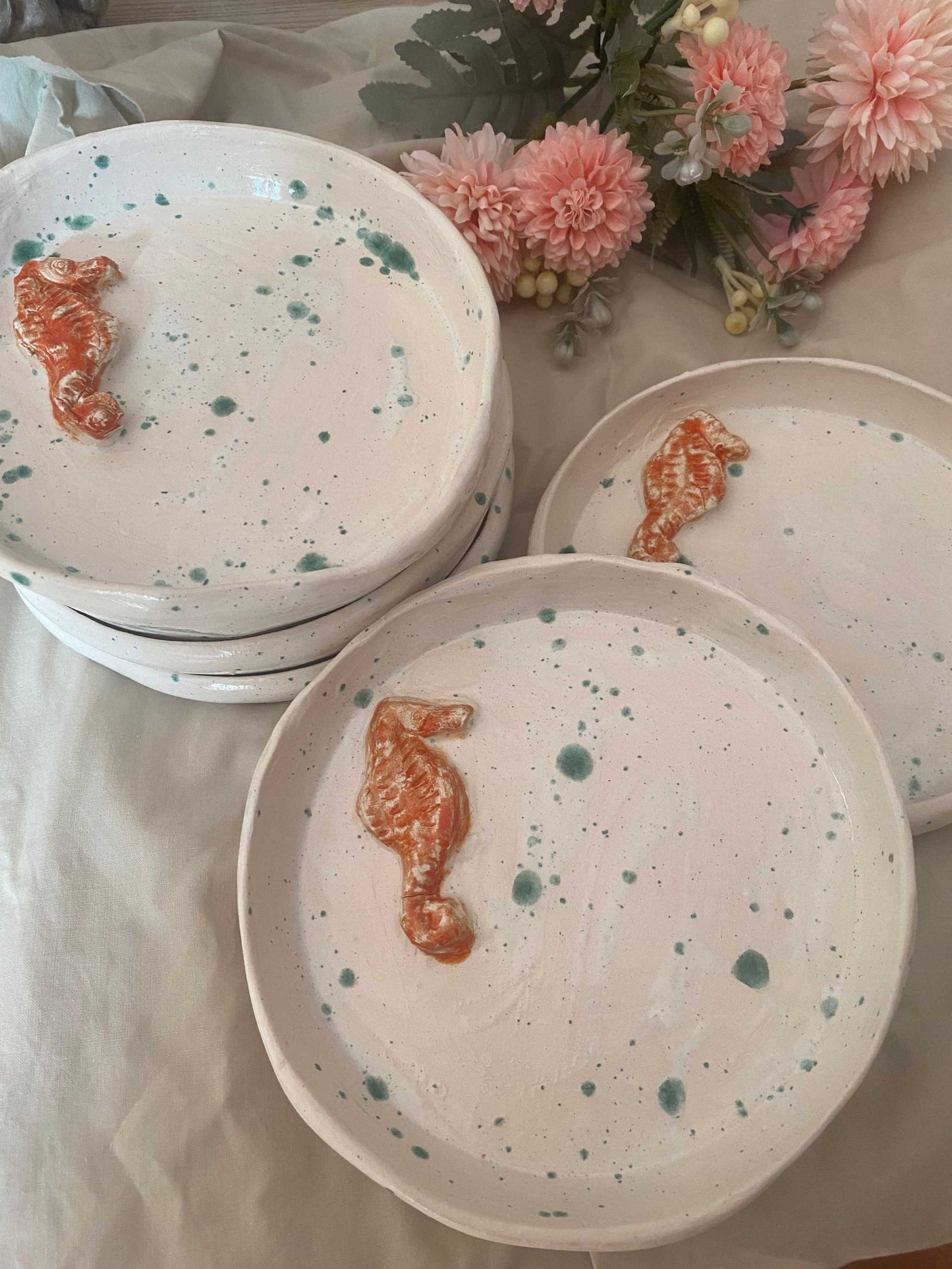 set of 6 white ceramic 18cm dessert plates with handmade seahorse design and blue speckles