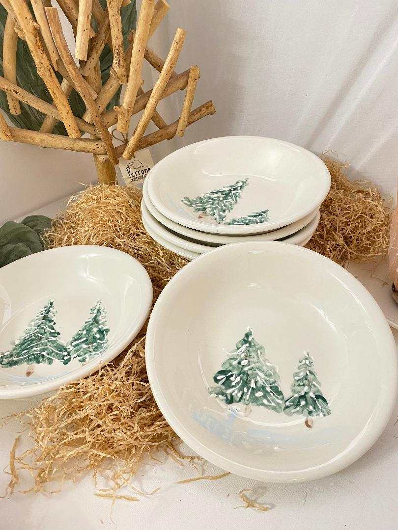 Set of 6 white ceramic deep plates with green Christmas tree design, winter collection-themed dinnerware.
