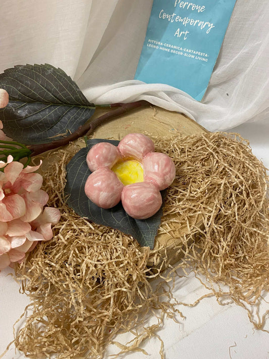 Spring collection ceramic jewelry holder shaped like a pink flower with green leaves for elegant storage